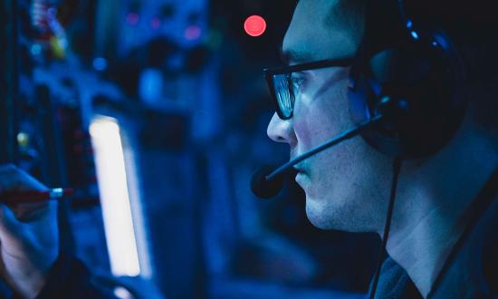A sailor on board the USS Porter (DDG-78)